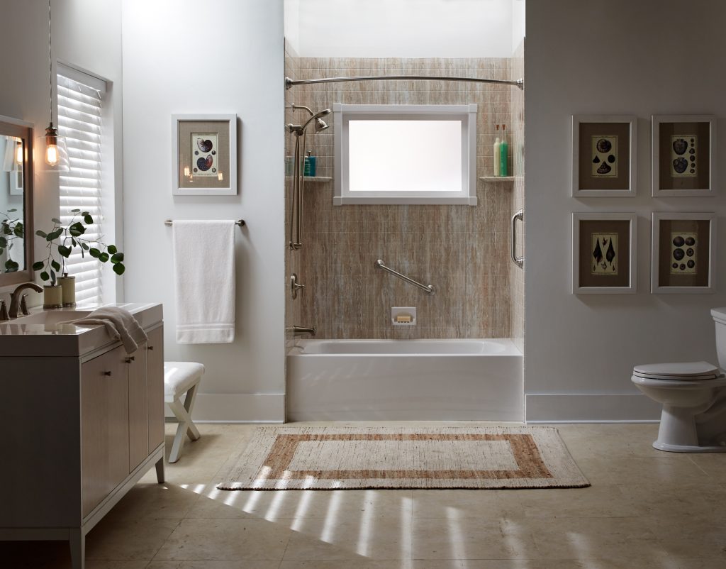 Remodeled bathroom with window and tan color scheme 